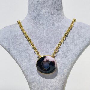 brown and pink circular symbol glass fusion necklace